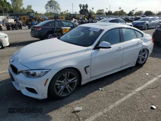 2015 BMW 4 Series 428i with VIN WBA4A9C59FGL87249, listed as a Copart auction lot 52182775 with 57,797 mi miles and Salvage title. Bid and sale history available at DreamBid. Image 1.
