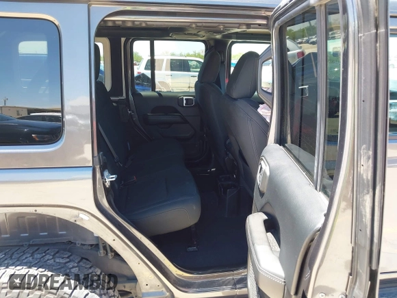 2018 Jeep Wrangler Unlimited Sahara with VIN 1C4HJXEN1JW236779, listed as a IAAI auction lot 42238158 with 72,879 mi miles and . Bid and sale history available at DreamBid. Image 8.