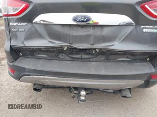 2016 Ford Escape Titanium with VIN 1FMCU0J9XGUC58149, listed as a IAAI auction lot 41739005 with 111,594 mi miles. Bid and sale history available at carsss.com. Image 16.