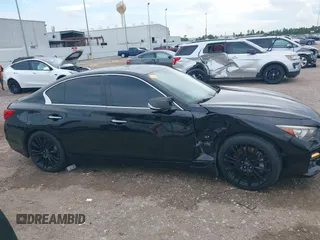 2015 Infiniti Q50 Sport z VIN JN1BV7AP7FM334447, wystawiony jako IAAI lot #42595908 z przebiegiem 168 214 mil mil oraz . Historia ofert i sprzedaży dostępna na DreamBid. Obrazek 13.