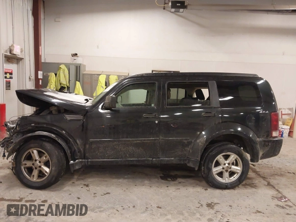 2010 Dodge Nitro SXT z VIN 1D4PU5GK4AW126578, wystawiony jako IAAI lot #41545180 z przebiegiem 203 078 mil mil oraz . Historia ofert i sprzedaży dostępna na DreamBid. Obrazek 14.