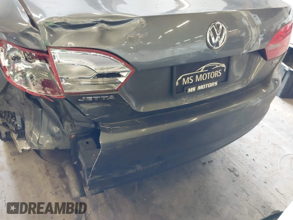 2014 Volkswagen Jetta SEL z VIN 3VWL17AJ8EM388218, wystawiony jako IAAI lot #41862353 z przebiegiem 140 514 mil mil oraz . Historia ofert i sprzedaży dostępna na DreamBid. Obrazek 15.
