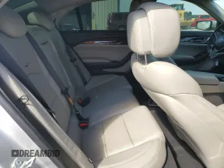 2014 Cadillac CTS Luxury RWD z VIN 1G6AR5SX0E0134728, wystawiony jako Copart lot #50812825 z przebiegiem 52 573 mil mil oraz Szkoda całkowita • Salvage title. Historia ofert i sprzedaży dostępna na DreamBid. Obrazek 11.