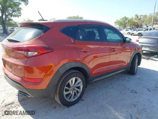 2016 Hyundai Tucson Limited with VIN KM8J33A23GU127742, listed as a IAAI auction lot 41796947 with 115,758 mi miles. Bid and sale history available at carsss.com. Image 4.