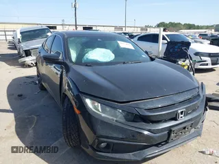 2020 Honda Civic Sedan Sport with VIN 2HGFC2F84LH600709, listed as a IAAI auction lot 41734047 with 74,318 mi miles. Bid and sale history available at carsss.com. Image 1.