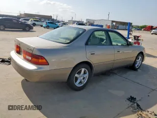 1999 Lexus ES 300 with VIN JT8BF28G6X5071297, listed as a Copart auction lot 54234895 with 223,870 mi miles and Clean title. Bid and sale history available at DreamBid. Image 3.