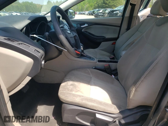 2016 Ford Focus SE z VIN 1FADP3F23GL355587, wystawiony jako Copart lot #53462345 z przebiegiem 101 628 mil mil oraz Szkoda całkowita • Salvage title. Historia ofert i sprzedaży dostępna na DreamBid. Obrazek 7.