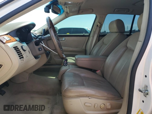 2006 Cadillac DTS 1SB z VIN 1G6KD57Y36U144765, wystawiony jako Copart lot #50603475 z przebiegiem 105 637 mil mil oraz Czysty tytuł • Clean title. Historia ofert i sprzedaży dostępna na DreamBid. Obrazek 7.