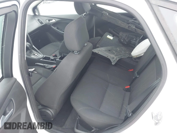 2017 Ford Focus SE with VIN 1FADP3F20HL235067, listed as a IAAI auction lot 41580300 with 79,009 mi miles and . Bid and sale history available at DreamBid. Image 8.