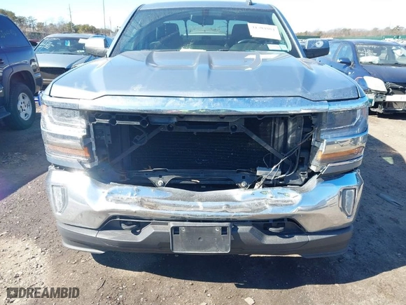 2016 Chevrolet Silverado 1500 LT with VIN 1GCVKREC6GZ125162, listed as a IAAI auction lot 41704884 with 100,656 mi miles. Bid and sale history available at carsss.com. Image 6.