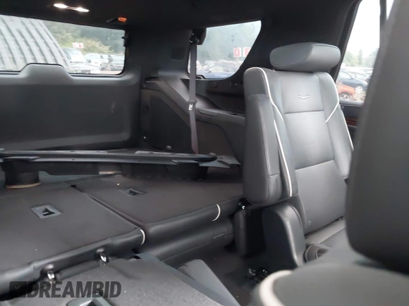 2023 Cadillac Escalade 4WD Premium Luxury with VIN 1GYS4CKL8PR456737, listed as a IAAI auction lot 42422723 with 22,658 mi miles and . Bid and sale history available at DreamBid. Image 8.