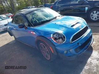2013 MINI Coupe S with VIN WMWSX3C55DT466604, listed as a IAAI auction lot 42033723 with 109,814 mi miles and . Bid and sale history available at DreamBid. Image 1.