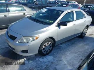 2010 Toyota Corolla with VIN JTDBU4EE3A9098933, listed as a IAAI auction lot 41643811 with 69,806 mi miles. Bid and sale history available at carsss.com. Image 2.
