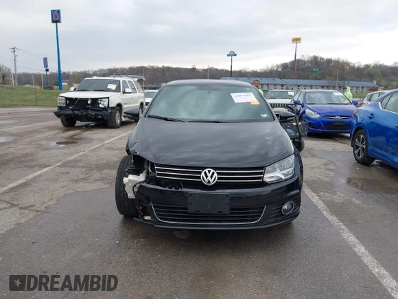 2014 Volkswagen Eos Komfort with VIN WVWBW8AH4EV007229, listed as a IAAI auction lot 41894160 with 66,984 mi miles and . Bid and sale history available at DreamBid. Image 12.