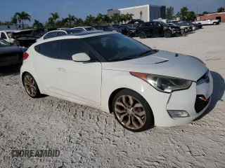 2013 Hyundai Veloster w/Black Int with VIN KMHTC6AD2DU156639, listed as a Copart auction lot 50435215 with 142,420 mi miles and Clean Title. Bid and sale history available at carsss.com. Image 4.