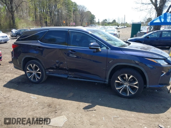 2019 Lexus RX 450hL Premium with VIN JTJDGKCA4K2006465, listed as a IAAI auction lot 42079022 with 77,241 mi miles and . Bid and sale history available at DreamBid. Image 13.