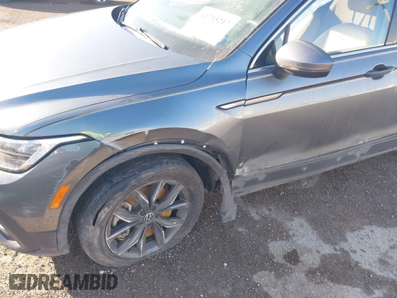 2022 Volkswagen Tiguan SE with VIN 3VV3B7AX1NM147445, listed as a IAAI auction lot 41755217 with 59,399 mi miles and . Bid and sale history available at DreamBid. Image 6.