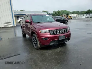 2020 Jeep Grand Cherokee Altitude with VIN 1C4RJFAG0LC209941, listed as a Copart auction lot 60164005 with 92,786 mi miles and Salvage title. Bid and sale history available at DreamBid. Image 14.