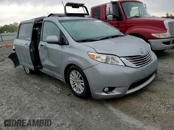 2015 Toyota Sienna XLE с VIN 5TDYK3DC7FS571431, выставлен на аукционе Copart как лот 57173595 с пробегом 305 940 миль миль и Списание • Salvage title. История ставок и продаж доступна на DreamBid. Изображение 14.
