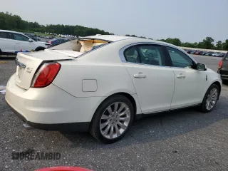 2012 Lincoln MKS z VIN 1LNHL9ER0CG803078, wystawiony jako Copart lot #60514765 z przebiegiem 82 715 mil mil oraz Szkoda całkowita • Salvage title. Historia ofert i sprzedaży dostępna na DreamBid. Obrazek 3.