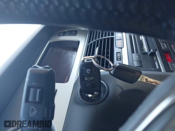2014 Audi Q7 Premium Plus with VIN WA1LGAFE5ED014701, listed as a IAAI auction lot 42107552 with 98,919 mi miles and . Bid and sale history available at DreamBid. Image 11.