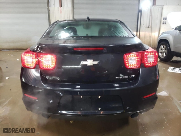 2013 Chevrolet Malibu LTZ with VIN 1G11J5SX6DF216858, listed as a Copart auction lot 44943265 with 124,962 mi miles and Salvage Title. Bid and sale history available at carsss.com. Image 6.