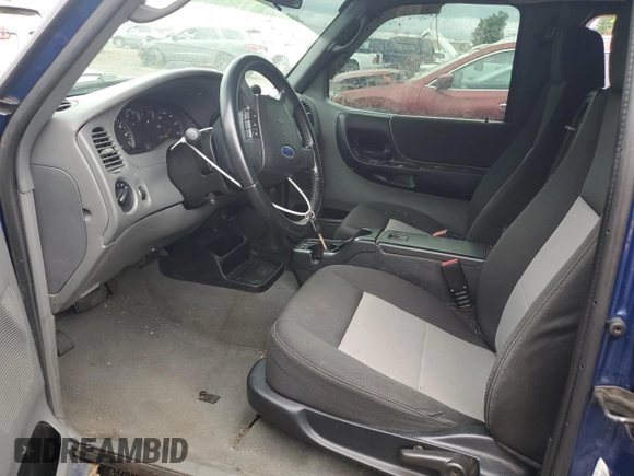 2007 Ford Ranger XLT z VIN 1FTZR45E77PA92881, wystawiony jako Copart lot #57588485 z przebiegiem Nie podano mil oraz Szkoda całkowita • Salvage title. Historia ofert i sprzedaży dostępna na DreamBid. Obrazek 7.