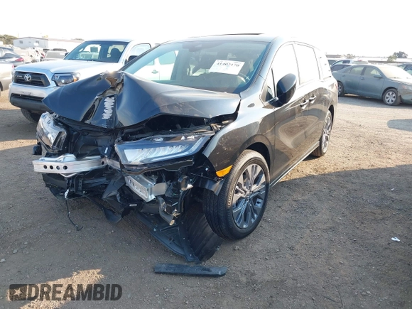 2025 Honda Odyssey Touring with VIN 5FNRL6H81SB011122, listed as a IAAI auction lot 41402170 with 2,968 mi miles and . Bid and sale history available at DreamBid. Image 18.
