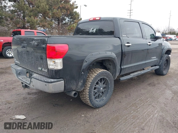 2012 Toyota Tundra 4WD Truck LTD with VIN 5TFHW5F19CX218772, listed as a IAAI auction lot 41472955 with 134,928 mi miles. Bid and sale history available at carsss.com. Image 4.