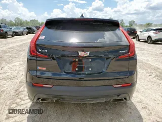 2023 Cadillac XT4 FWD Luxury with VIN 1GYAZAR46PF178003, listed as a Copart auction lot 59121545 with 42,000 mi miles and Salvage title. Bid and sale history available at DreamBid. Image 6.
