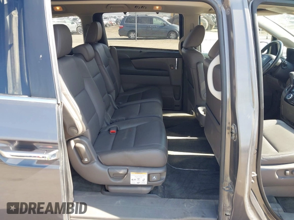 2014 Honda Odyssey EX-L z VIN 5FNRL5H64EB031426, wystawiony jako IAAI lot #41777542 z przebiegiem 162 426 mil mil oraz . Historia ofert i sprzedaży dostępna na DreamBid. Obrazek 8.