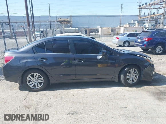 2015 Subaru Impreza Premium z VIN JF1GJAC66FH023543, wystawiony jako IAAI lot #42349447 z przebiegiem 70 601 mil mil oraz . Historia ofert i sprzedaży dostępna na DreamBid. Obrazek 13.