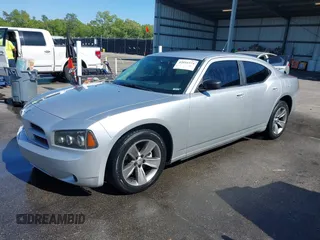 2008 Dodge Charger with VIN 2B3KA43R38H103039, listed as a IAAI auction lot 42051574 with 216,514 mi miles and . Bid and sale history available at carsss.com. Image 2.