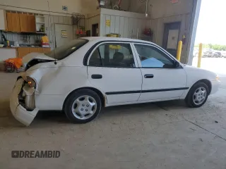 1999 Chevrolet Prizm z VIN 1Y1SK5281XZ429846, wystawiony jako Copart lot #56907955 z przebiegiem 90 581 mil mil oraz Szkoda całkowita • Salvage title. Historia ofert i sprzedaży dostępna na DreamBid. Obrazek 3.