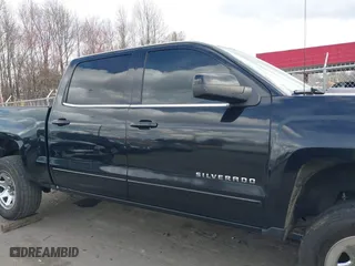 2016 Chevrolet Silverado 1500 LT with VIN 3GCUKREC3GG198548, listed as a IAAI auction lot 41718152 with 189,416 mi miles. Bid and sale history available at carsss.com. Image 13.