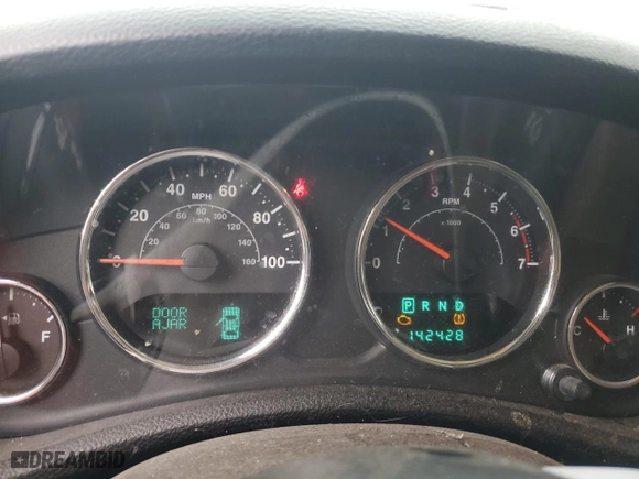 2011 Jeep Wrangler Unlimited Sahara with VIN 1J4BA5H16BL557068, listed as a Copart auction lot 80429454 with 142,428 mi miles and Salvage Title. Bid and sale history available at carsss.com. Image 9.