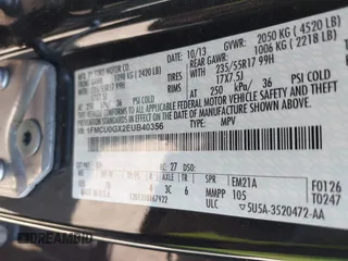 2014 Ford Escape SE with VIN 1FMCU0GX2EUB40356, listed as a IAAI auction lot 42142617 with 156,703 mi miles. Bid and sale history available at carsss.com. Image 9.