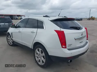 2014 Cadillac SRX Premium Collection with VIN 3GYFNDE31ES615995, listed as a IAAI auction lot 42148943 with 232,752 mi miles and . Bid and sale history available at DreamBid. Image 3.