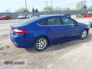 2014 Ford Fusion SE with VIN 3FA6P0H74ER389455, listed as a IAAI auction lot 42139910 with 237,252 mi miles. Bid and sale history available at carsss.com. Image 4.
