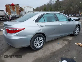 2015 Toyota Camry XLE with VIN 4T4BF1FK1FR468666, listed as a IAAI auction lot 42005934 with 124,173 mi miles and . Bid and sale history available at DreamBid. Image 4.