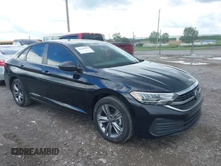 2023 Volkswagen Jetta SE with VIN 3VW7M7BU0PM042961, listed as a IAAI auction lot 42210432 with 14,610 mi miles and . Bid and sale history available at DreamBid. Image 1.