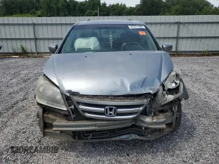 2005 Honda Odyssey EX-L with VIN 5FNRL38765B088756, listed as a Copart auction lot 57071365 with 243,277 mi miles and Salvage title. Bid and sale history available at DreamBid. Image 5.
