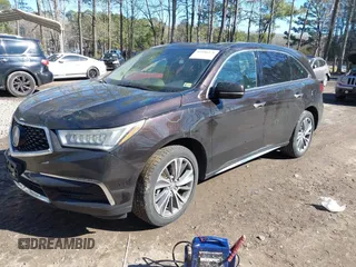 2017 Acura MDX w/Technology Pkg with VIN 5FRYD4H51HB006562, listed as a IAAI auction lot 41656371 with 64,142 mi miles. Bid and sale history available at carsss.com. Image 2.