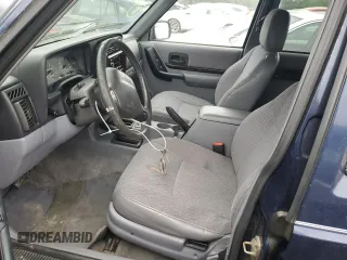 1997 Jeep Cherokee Country with VIN 1J4FJ78S4VL589852, listed as a Copart auction lot 56294015 with 189,530 mi miles and Salvage title. Bid and sale history available at DreamBid. Image 7.