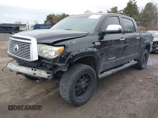 2012 Toyota Tundra 4WD Truck LTD with VIN 5TFHW5F19CX218772, listed as a IAAI auction lot 41472955 with 134,928 mi miles. Bid and sale history available at carsss.com. Image 18.