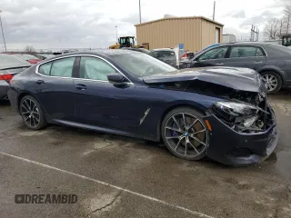 2020 BMW 8 Series M850i with VIN WBAGV8C02LCE55493, listed as a Copart auction lot 47229635 with Not provided miles and Salvage title. Bid and sale history available at DreamBid. Image 4.