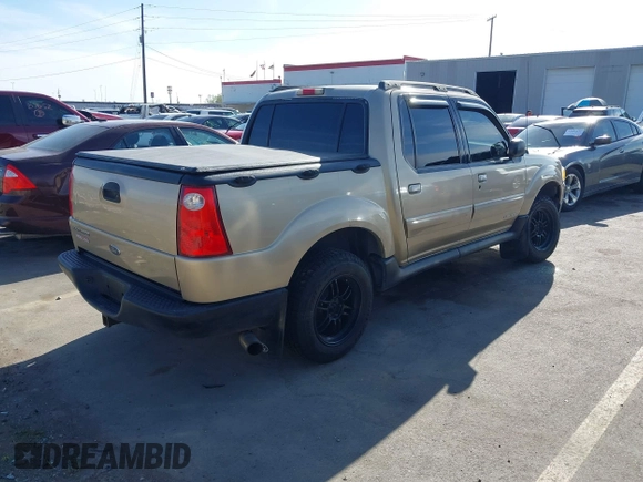 2001 Ford Explorer Sport Trac z VIN 1FMZU77E41UA58737, wystawiony jako IAAI lot #42099243 z przebiegiem 203 593 mil mil oraz . Historia ofert i sprzedaży dostępna na DreamBid. Obrazek 4.