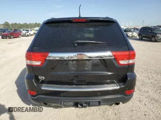 2012 Jeep Grand Cherokee Overland with VIN 1C4RJECT5CC362819, listed as a Copart auction lot 48130085 with 107,350 mi miles and Salvage Title. Bid and sale history available at carsss.com. Image 6.