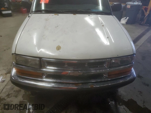 2001 GMC Sonoma SLS 1SG z VIN 1GTCS19W818228836, wystawiony jako Copart lot #85732914 z przebiegiem Nie podano mil oraz Tytuł czysty. Historia ofert i sprzedaży dostępna na DreamBid. Obrazek 11.