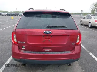 2014 Ford Edge SEL z VIN 2FMDK4JC2EBB09752, wystawiony jako IAAI lot #42180224 z przebiegiem 107 503 mil mil oraz . Historia ofert i sprzedaży dostępna na DreamBid. Obrazek 16.